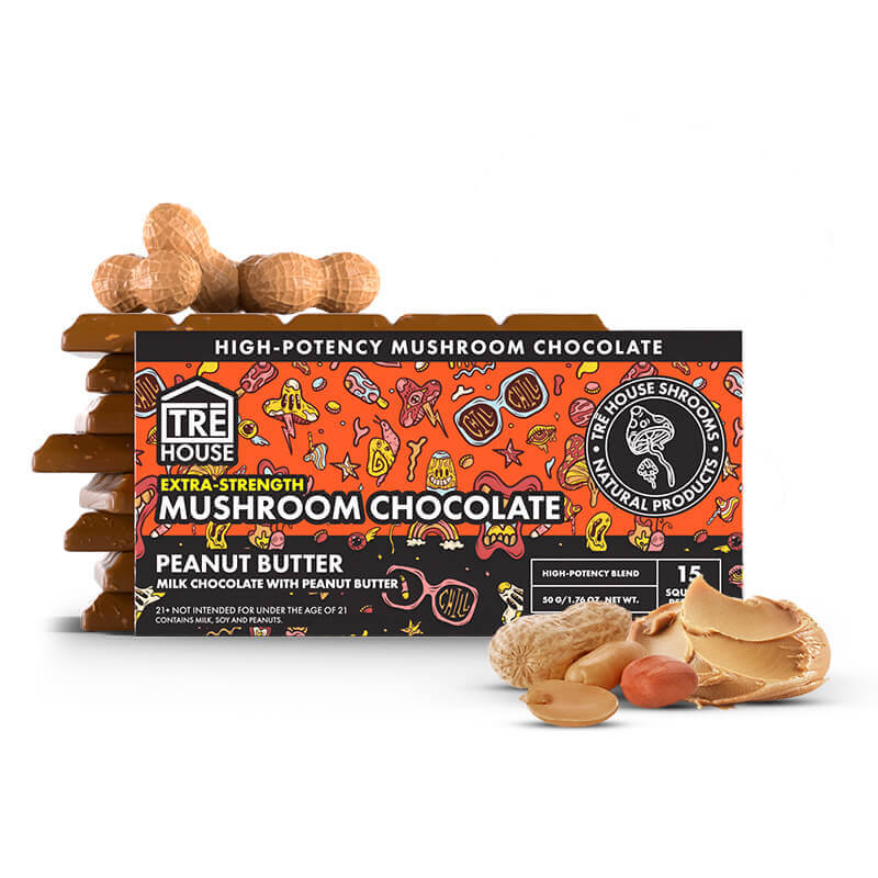 Pack of Tre House Mushroom Chocolate with peanut butter flavor, surrounded by chocolate pieces and peanuts on a white background.