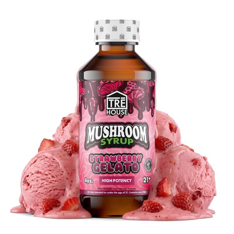 Bottle of Tre House Mushroom Syrup Strawberry Gelato with pink ice cream and strawberries on a white background