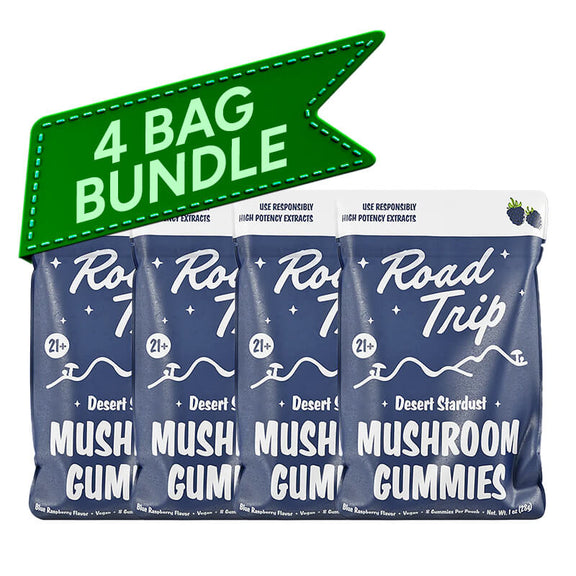 Four packs of Road Trip Desert Stardust Mushroom Gummies with a green banner indicating a 4-pack bundle on a white background.