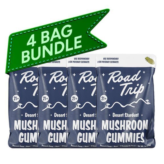 Four packs of Road Trip Desert Stardust Mushroom Gummies with a green banner indicating a 4-pack bundle.